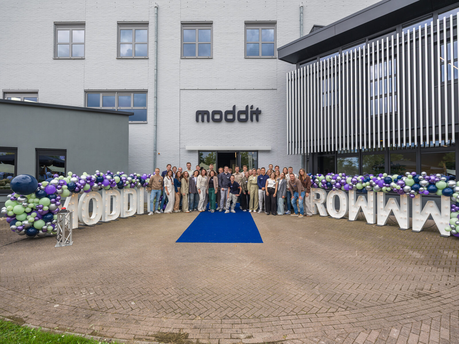 Moddit groepsfoto opening